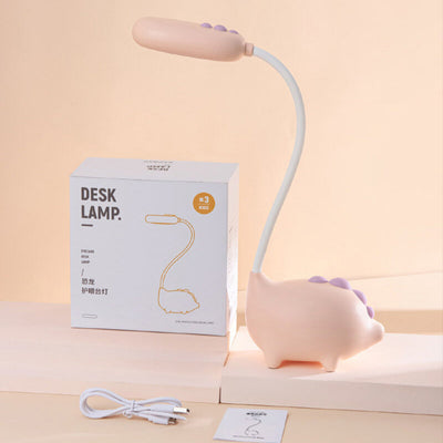 DinoGlow - Wiederaufladbare LED-Schreibtischlampe mit Cartoon-Dinosaurier-Design