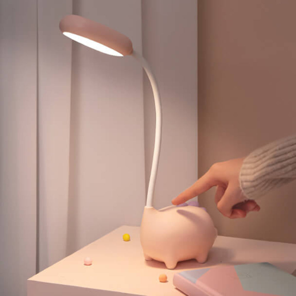 DinoGlow - Wiederaufladbare LED-Schreibtischlampe mit Cartoon-Dinosaurier-Design