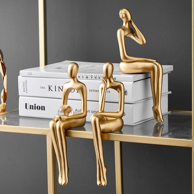 GoldenMuse - Minimalistisches goldenes Bücherregal Figur