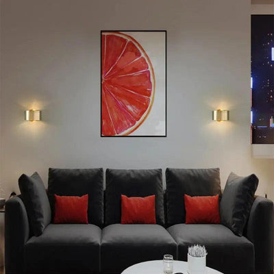 Lenara - Moderne Wandleuchte mit eleganter schwarzer und messingfarbener Oberfläche