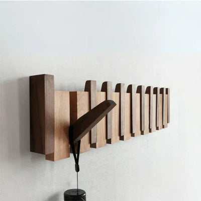 Klavier-inspirierter Garderobenständer aus Holz - Elegante Wandhaken