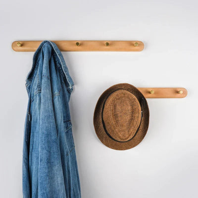 Platzsparende Wandhaken - Holz- und Messingausführung